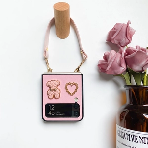 Pink quilted leather phone case for Samsung Z Flip with bear charm and gold chain strap