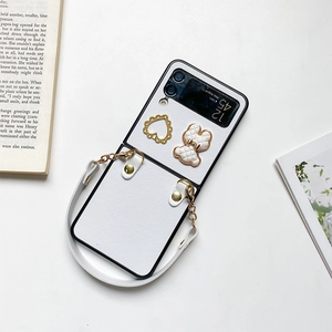 White cross-textured flip case for Samsung Galaxy Z Flip with bear and heart charms