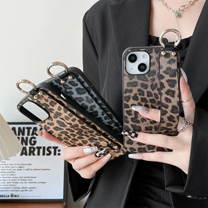 Leopard print iPhone case with metal ring holder and leather hand strap in two colors