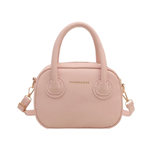 Pale pink minimalist handbag with adjustable strap and golden Fashion & Bags text