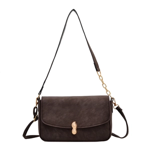 Deep brown crossbody bag with gold peanut buckle and stylish chain strap detail