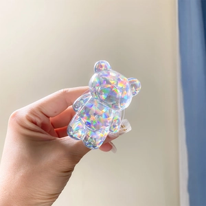 Detail of laser iridescent bear phone socket showing multi-faceted diamond texture