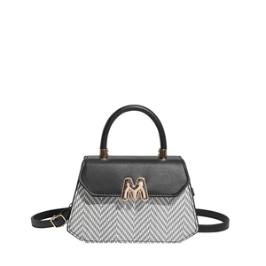Trendige zweifarbige Trapez-Handtasche aus schwarzem Leder und Tweed mit M-Schnalle