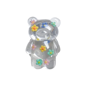 Cute transparent bear phone grip with colorful floral resin patterns and a stable stand
