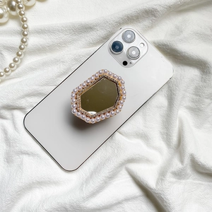 Supporto per telefono ottagonale con perle, specchio e strass su cover bianca