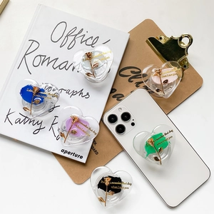 Acrylic heart phone grip with golden rose and I also remember that day text