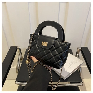 Classic black quilted leather handbag with gold chain strap and spherical charm detail