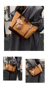 Detail of retro tote bag featuring cat pattern embossing and cute teddy bear charm