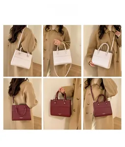 Minimalist leather tote bag shown in cream white and burgundy for daily commute outfit ideas
