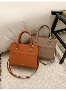 Minimalist square tote bags in caramel and taupe faux leather with silver rivets