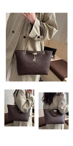 Detail of dark brown tote bag with gold chain strap and deer pendant ornament