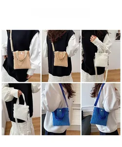 Detailed views of corduroy mini crossbody bags in beige, white and blue colors