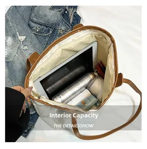 Large capacity tote bag interior showing space for tablet, spray, and daily essentials