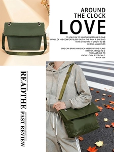 Detail of dark green flap crossbody bag with adjustable wide strap and matte texture