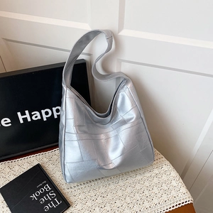 Silver metallic hobo tote bag with quilted stitching for minimalist casual daily wear