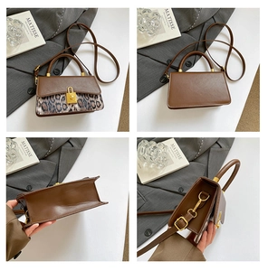 Detail view of the vintage brown leopard print handbag with gold square clasp lock