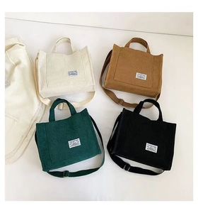 Corduroy tote bags in cream, brown, green and black with adjustable straps
