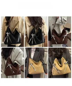 Collage of chic tote bags with bow ribbon accents and diagonal zippers in three colors