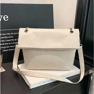 Minimalist creamy white flap crossbody bag with silver chain and wide textile strap