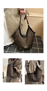 Close-up of leopard print canvas tote with black leather trim and rectangular logo patch