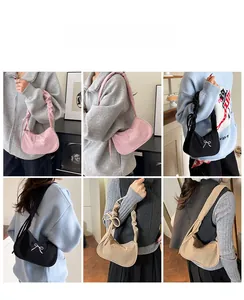 Borsa a spalla in velluto a coste con fiocco e manici arricciati in diversi colori