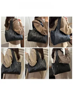 Litchi texture black tote bag shown on models for size and styling comparison