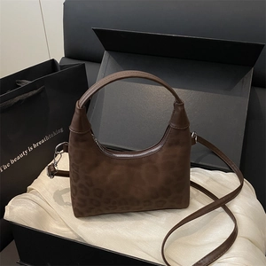 Retro brown leopard print crossbody dumpling bag in a luxury gift box packaging