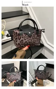 Detailed views of leopard print hobo bag with black leather flap and handle accents