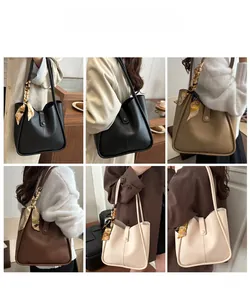 Collage of large leather tote bags in four colors with printed silk scarf details