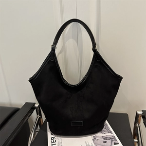 Minimalist black suede Hobo tote bag with stylish gold metal accents and large capacity