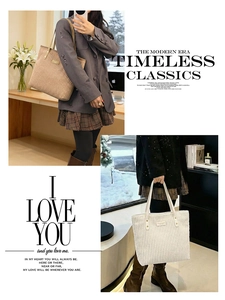 Detailed texture of vertical stripe corduroy tote bag in khaki and off-white colors