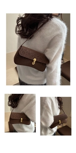 Detail of retro leopard print underarm bag with gold metal buckle and suede texture