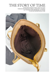 Detail shot of the spacious corduroy tote bag interior with zip closure and lining