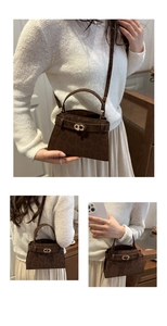 Detailed view of dark brown leopard print mini bag with golden metal CD twist lock and strap