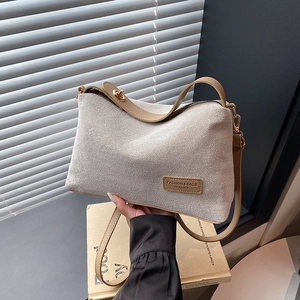 Retro canvas shoulder bag with caramel leather strap and fashion leather patch detail
