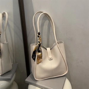 Cream white large capacity tote bag with decorative silk scarf on handle for daily commute