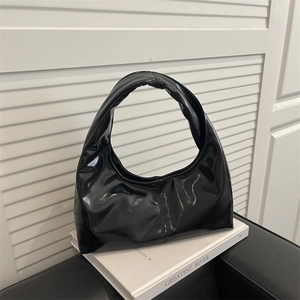 Glossy black patent leather hobo handbag with high-shine finish for daily fashion