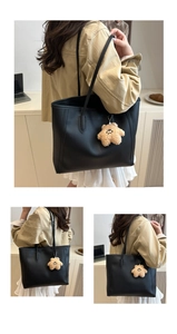 Black tote bag with a plush star pendant shown from multiple angles on a model