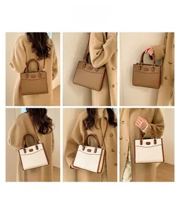 Dettagli sulle versatili opzioni di trasporto per questa elegante borsa capiente