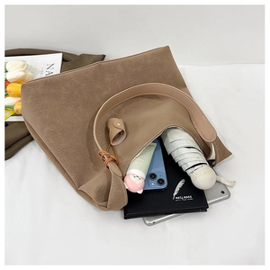 Top view of large capacity tote bag showing interior space for tablet, umbrella and diary