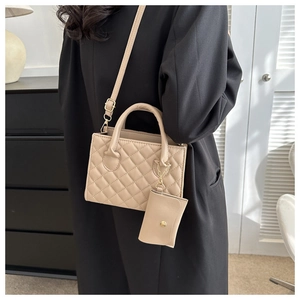Chic beige quilted crossbody bag with a matching mini pouch and elegant gold-tone hardware