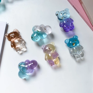 Detail of 3D bear phone socket featuring gradient resin texture and gold foil flakes