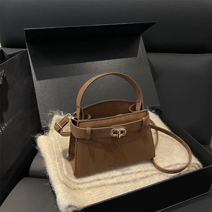 Luxury dark brown suede handbag with golden CD metal buckle in an elegant gift box