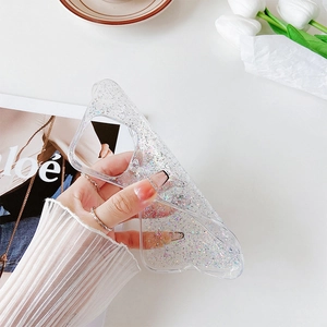Custodia glitter trasparente per iPhone 16 Pro Max in un elegante contesto lifestyle