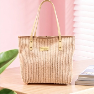 Minimalist beige corduroy tote bag with leather handles for women's daily commute