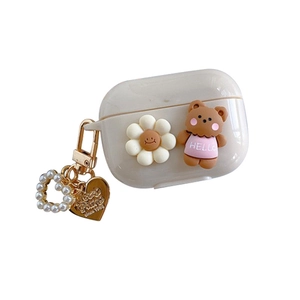 Creamy silicone AirPods Pro case with 3D bear and white flower charm accessories