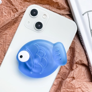 3D blue fish collapsible phone grip with matte texture and embossed scales