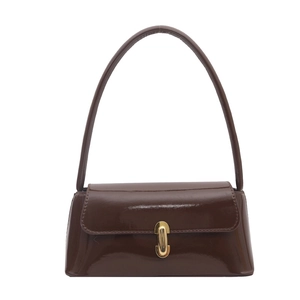 Glossy dark brown patent leather shoulder bag with gold oval buckle on a plain background