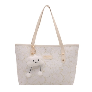 White quilted tote bag with wave texture and cloud charm for stylish women fashion