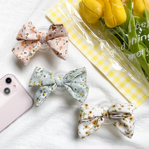 Set di 3 supporti per cellulare con fiocco in tessuto floreale rosa verde e crema